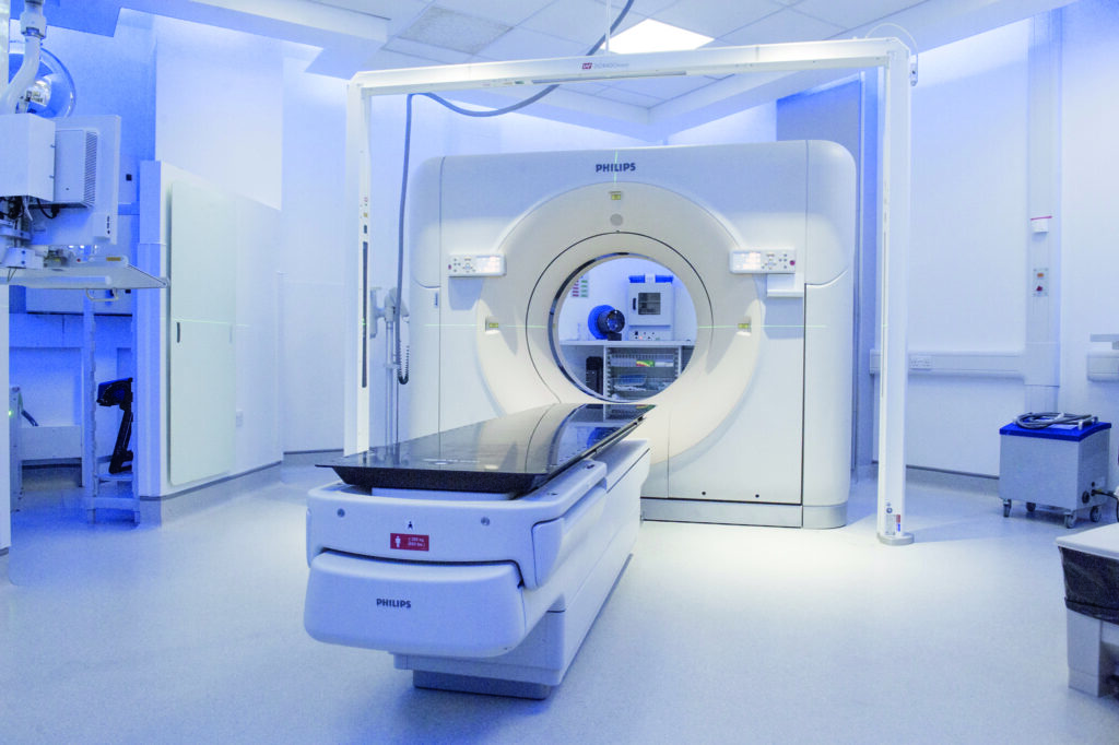 A photograph showing a CT Scanner.