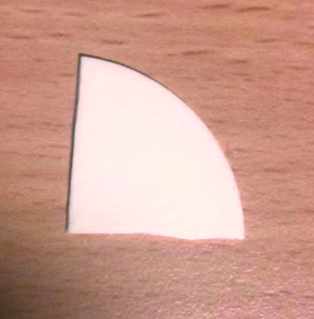 Photograph of the patch with three quarters of the cover patch removed