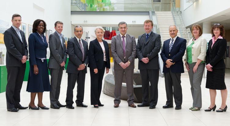 Group picture of staff meeting with delegates from the King Hussein Cancer Center.