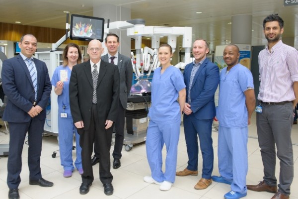 Urology team pose with robot