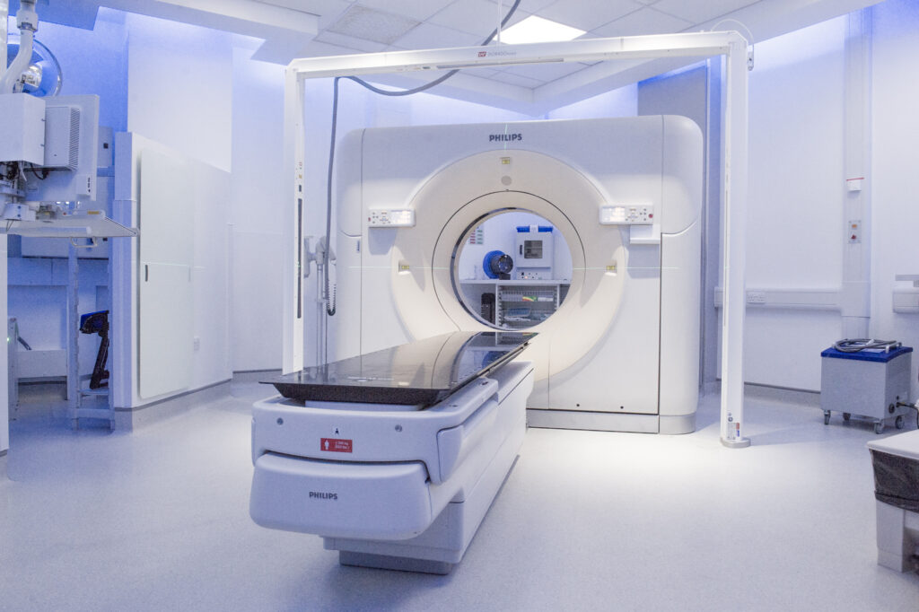An image showing a CT scanner machine.