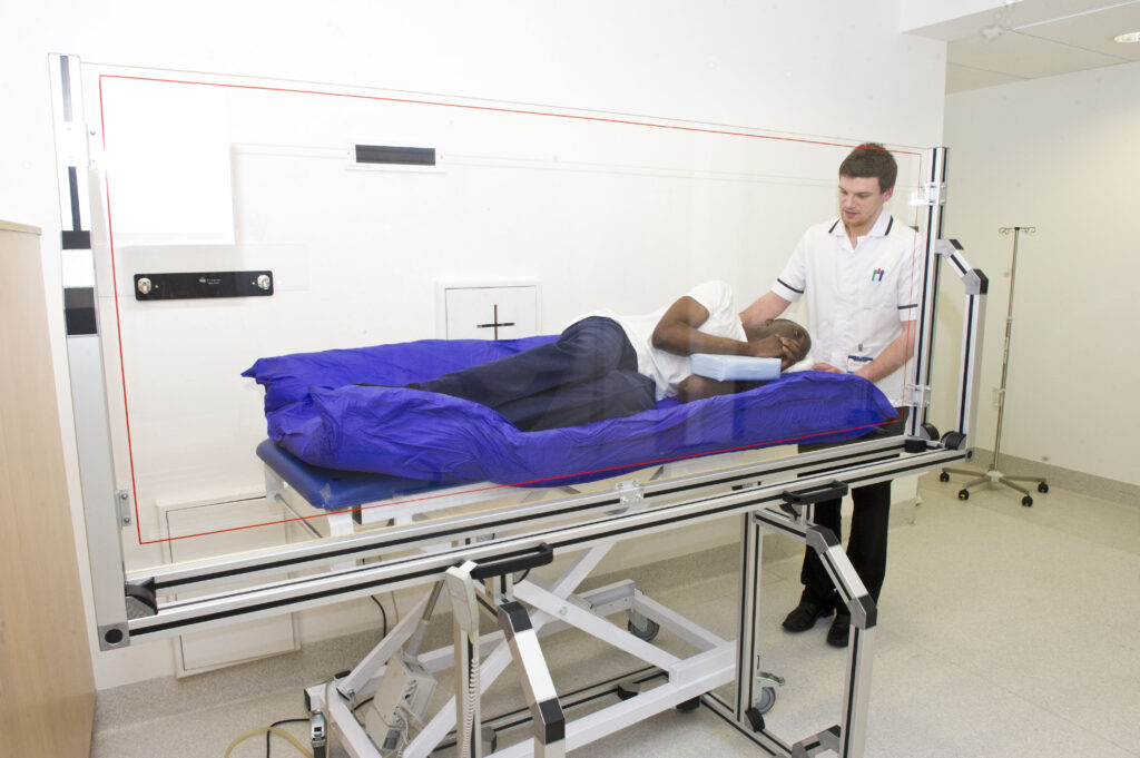 An image showing a patient lying on their side.