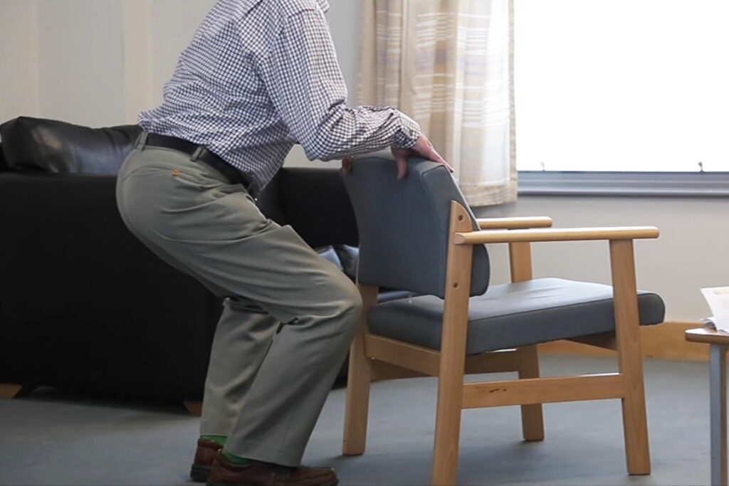 Photograph of a person doing squats
