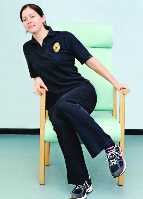 Photograph of a person moving side to side and lifting the bottom, pressure is relieved for a short time.