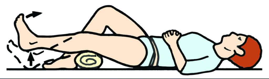 Illustration showing the place a rolled towel or blanket under your knee exercise.
Place a rolled towel or blanket under the knee during this exercise. You must remove it immediately when you have finished. Lift the heel off the bed, straighten the knee and hold for five seconds. Lower slowly. Repeat until the muscle feels tired.