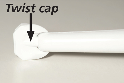 Image showing how to open an enema tube by twisting or pulling the cap off the end of the nozzle.