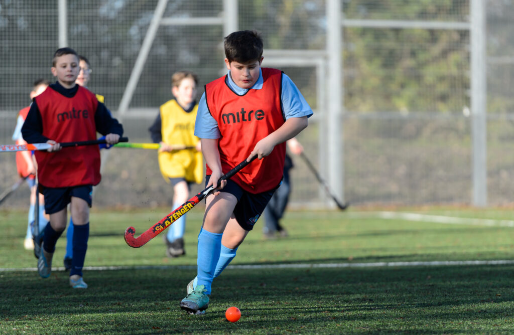 Image of children playing hockey