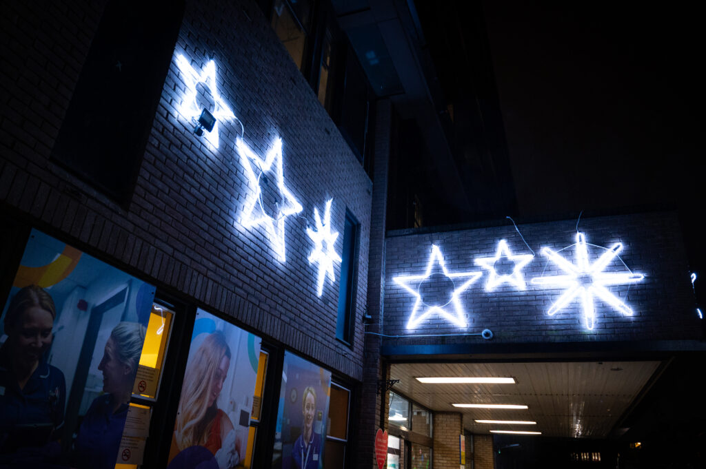 An image showing the Christmas lights switched on outside the Leeds Children's Hospital Christmas Lights for 2023.