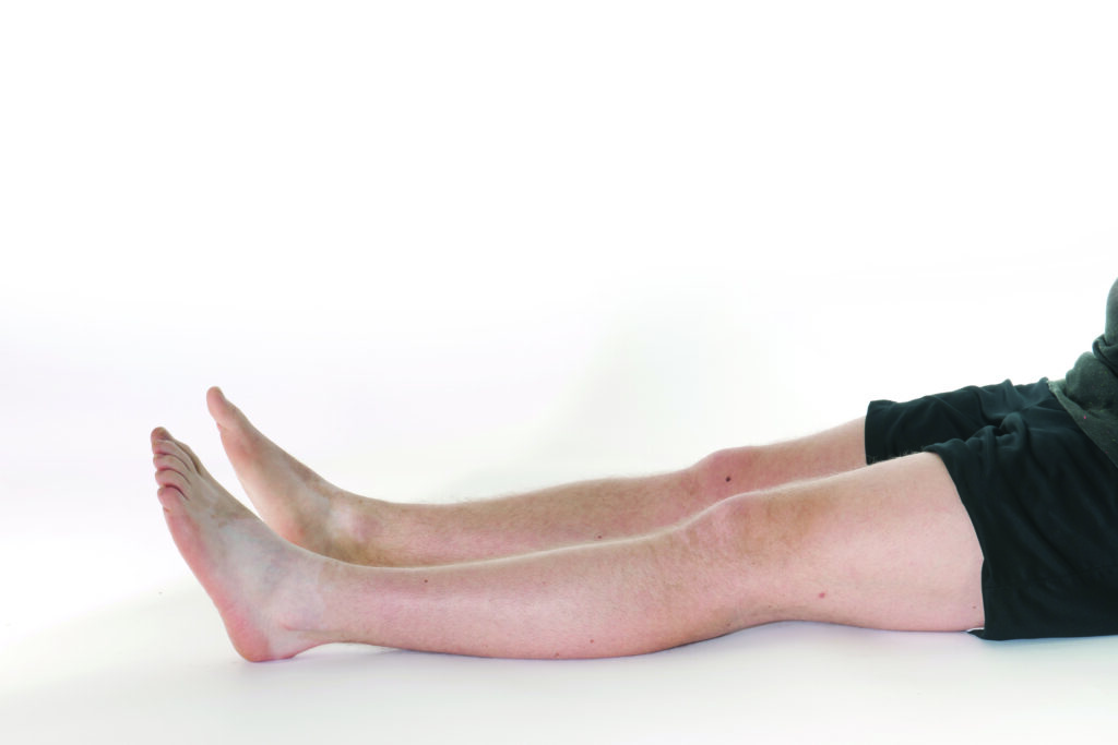 Photograph showing the 'Knee Bend' exercise.
