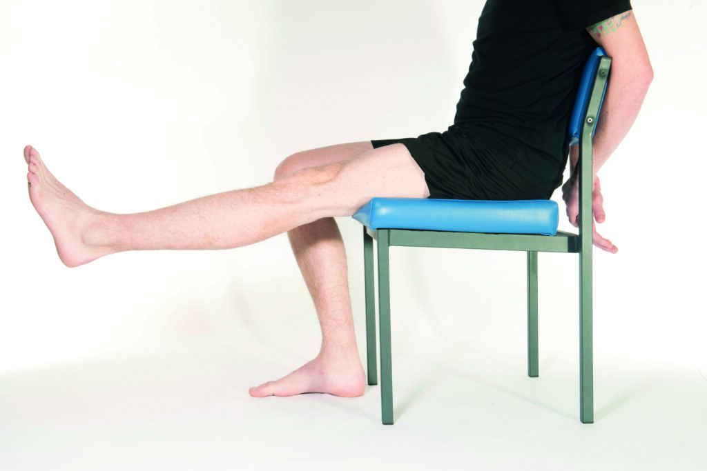 Photograph showing the 'Knee Extension' exercise.