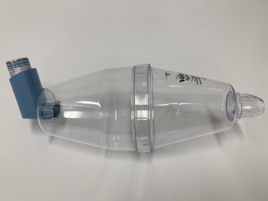 Photograph of a Volumatic spacer with inhaler