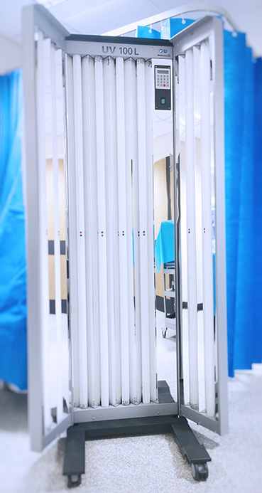 Photo of the UVB machine wit hthe doors open and closed
