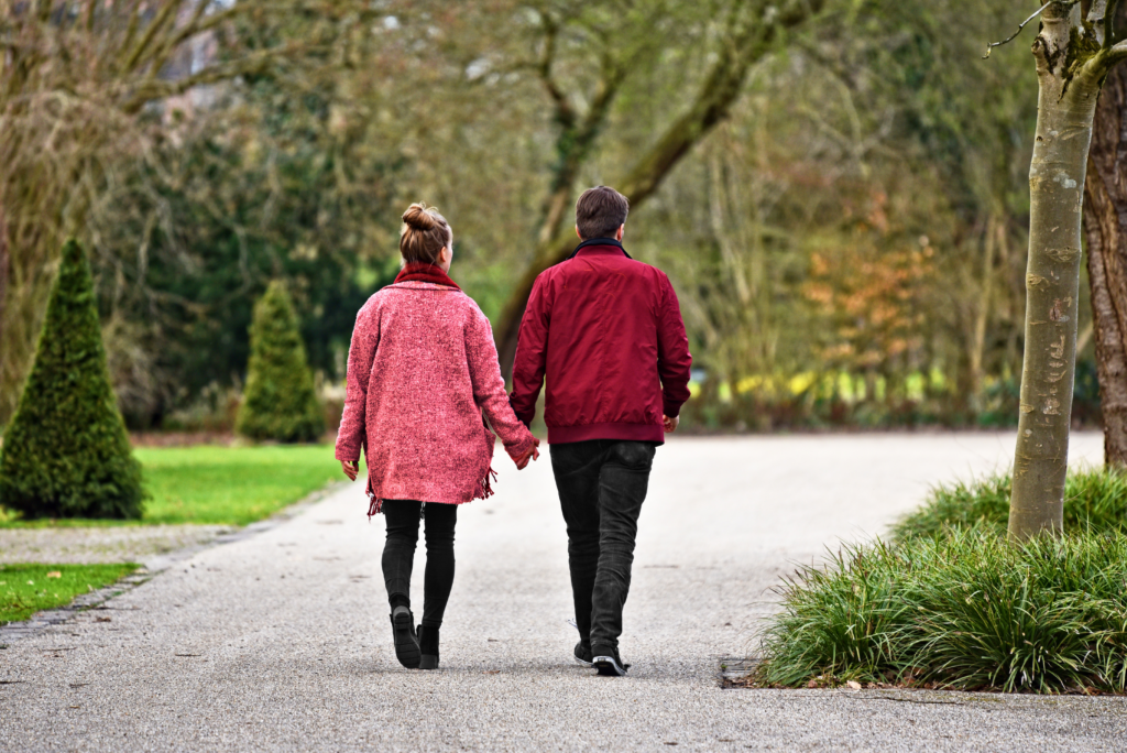 Couple going for a gentle walk in a park