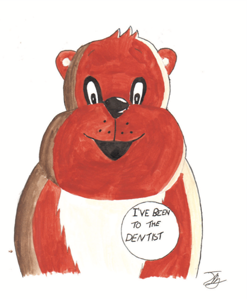 Fluffy the bear has woken up and is feeling well, he is wearing a badge saying I've been to the dentist