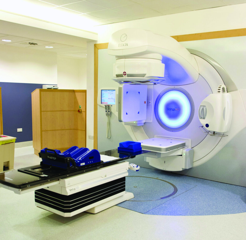 A Photograph of a radiotherapy treatment machine.
