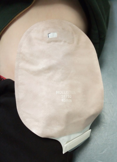 Photo showing the bag in place with the bottom rolled up to prevent any leaks