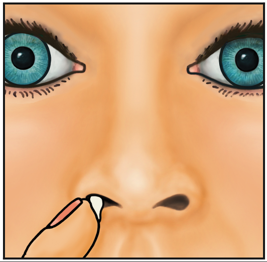 Putting cream into the nostril