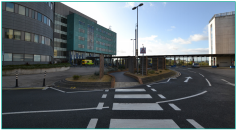 Bexley Route Outside (J46 or J47) - - You will go over a zebra crossing as you head towards Bexley Wing. Walk between the wooden panelling on the path.