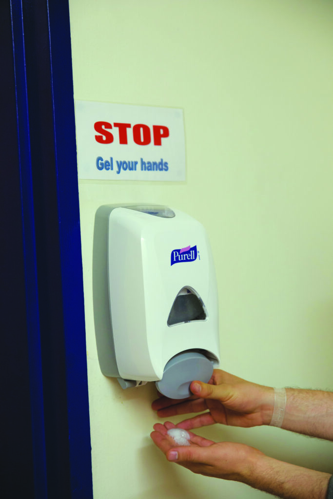 Photograph of a hand gel dispenser.