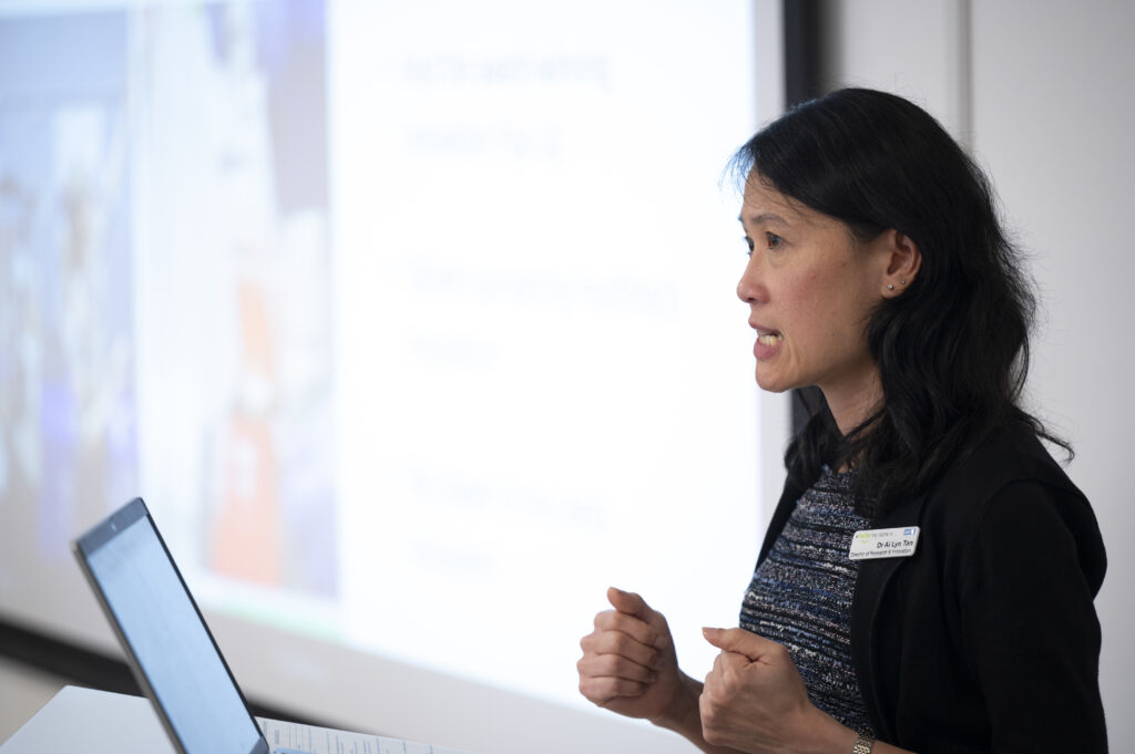 An image of Dr Ai Lyn Tan presenting at the NIA event.
