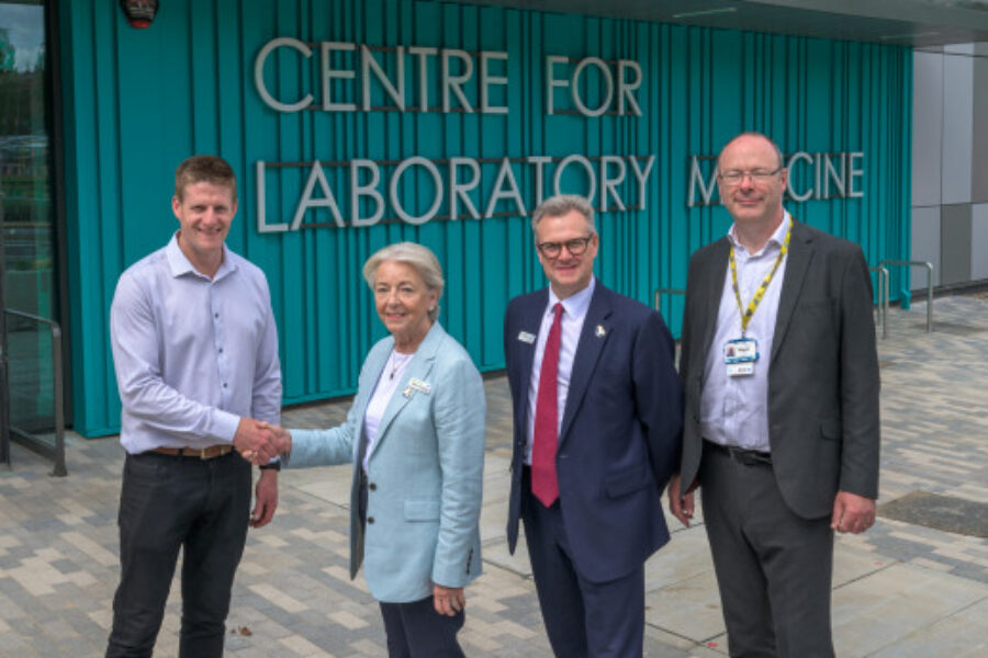 Dame Linda Pollard and Prof Phil Wood outside the new centre