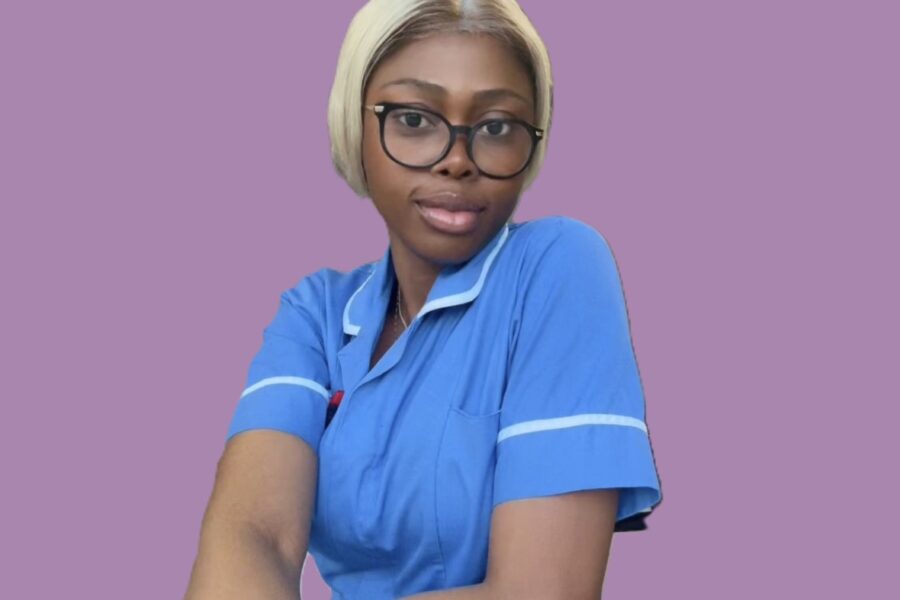 Picture of Ejiro in her blue nurses uniform